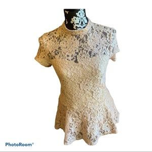 Blush color lace peplum top.